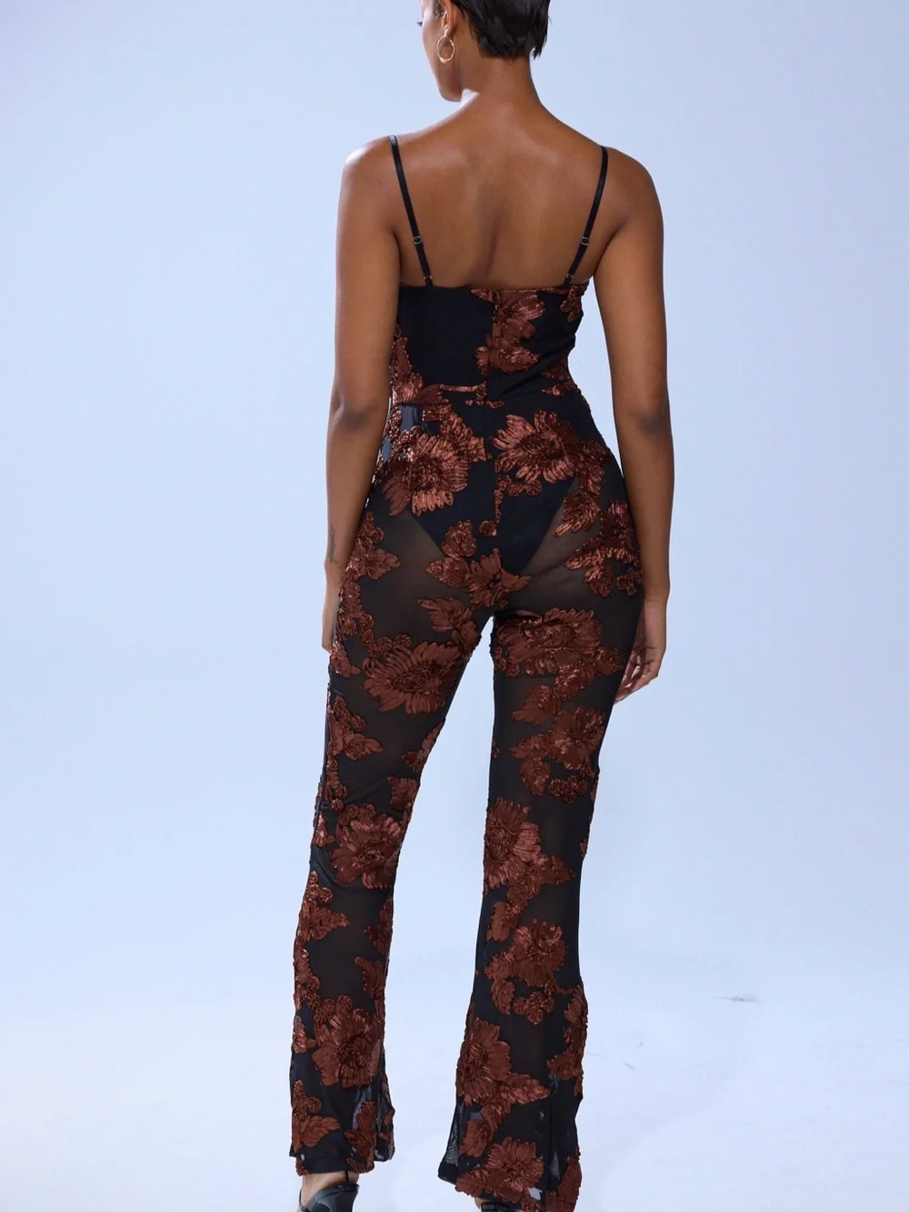 AKIRA Black Sheer Jumpsuit with Brown Floral Appliqué